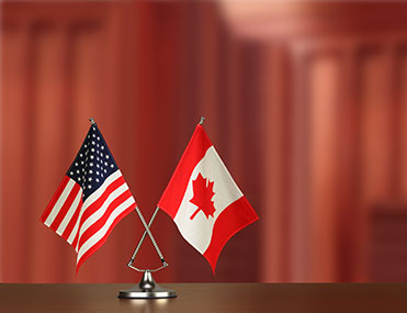 U.S. Tariffs Go Ahead, Canada Plans Counter-Tariffs